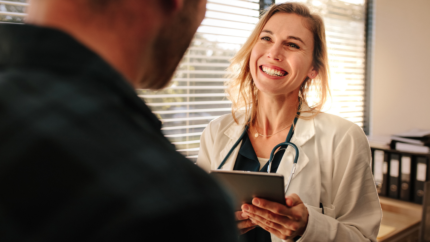 Smiling female doctor in a clinical setting