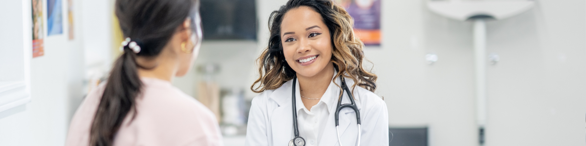 female doctor smiling at patient