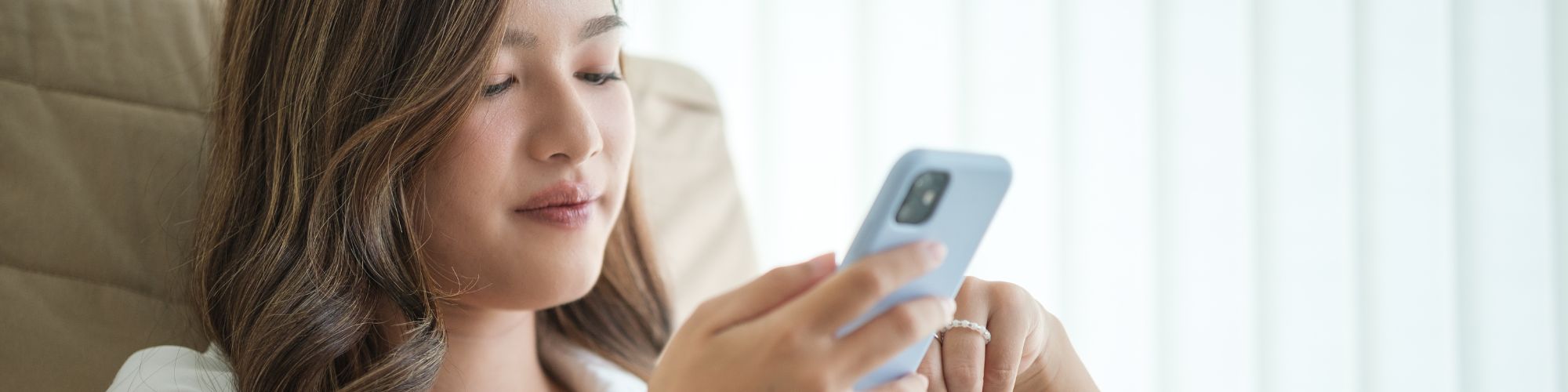 healthcare professional scrolling on phone
