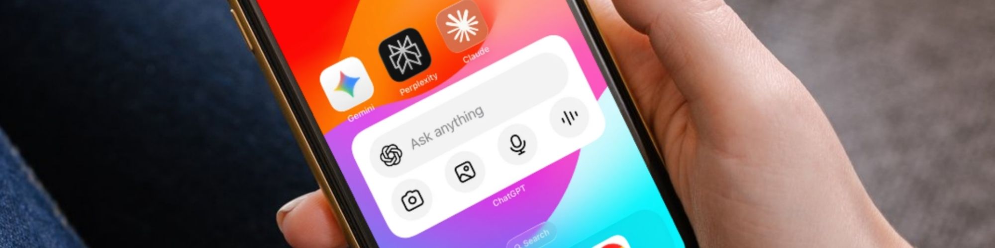 person holding a cell phone with AI apps on the home screen