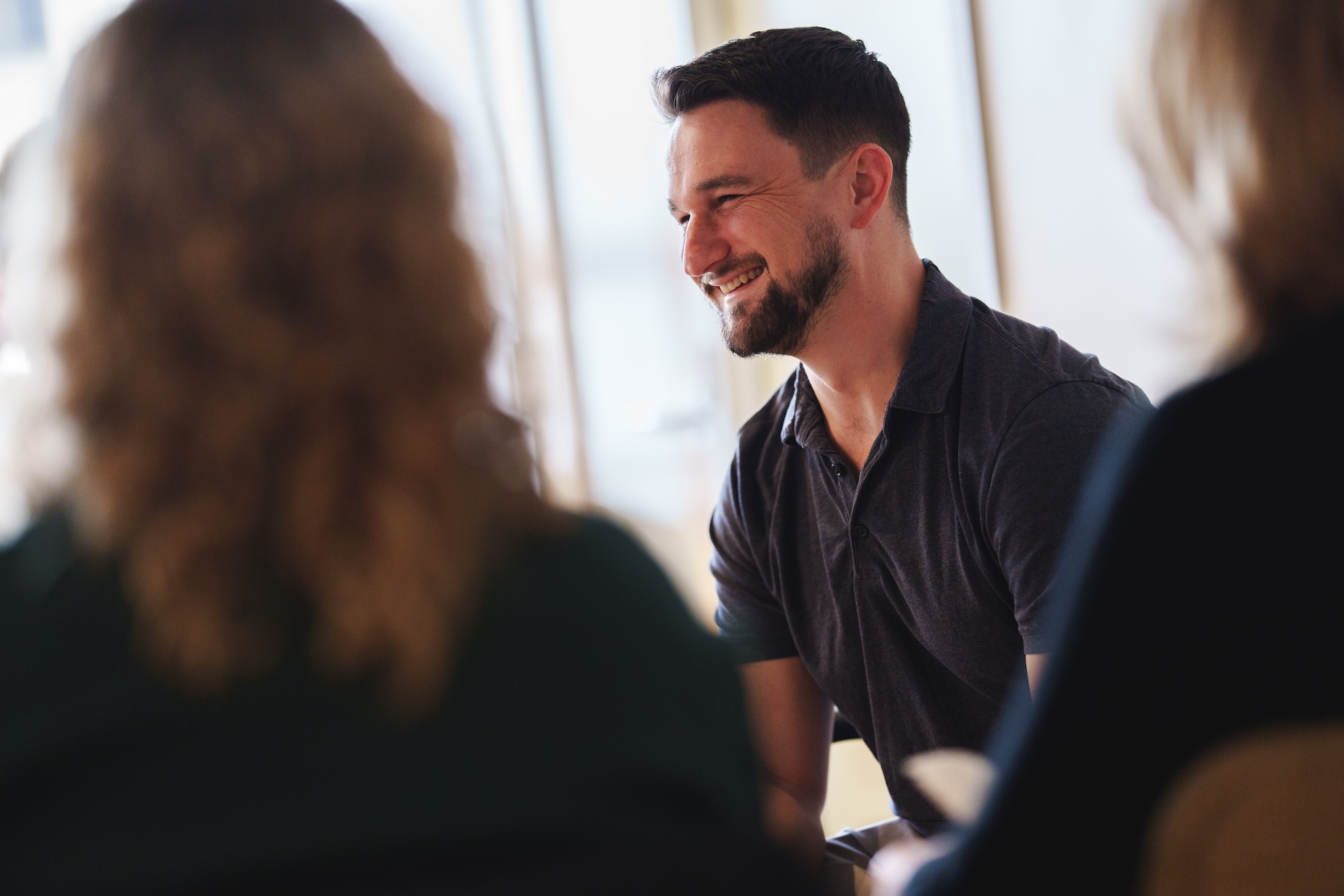 Smiling healthcare professional representing performance marketing success for privacy-first industries